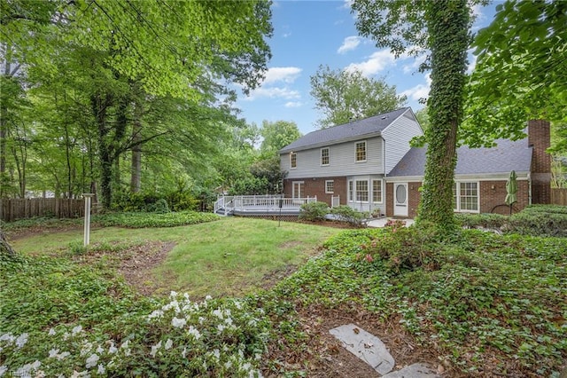 1808 Dunleith Way, Greensboro, NC 27455 - view of yard featuring a wooden deck
