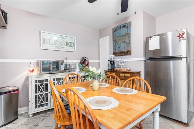 422 Hyde St, Burlington, NC 27217 - dining area featuring light tile patterned floors and ceiling fan