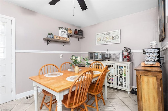 422 Hyde St, Burlington, NC 27217 - dining room with light tile patterned floors and ceiling fan