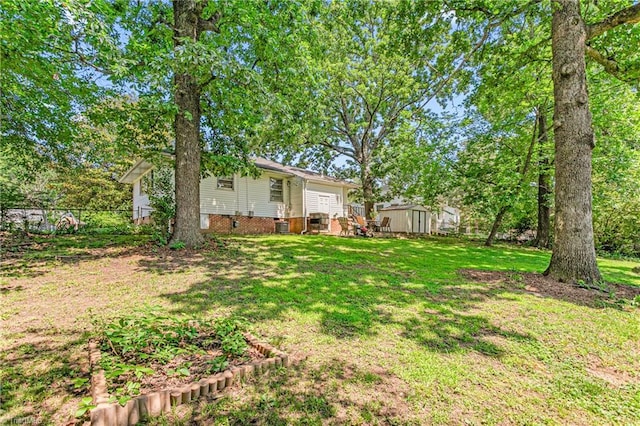 422 Hyde St, Burlington, NC 27217 - view of yard with central air condition unit