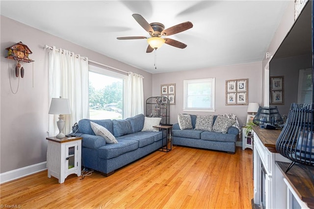 422 Hyde St, Burlington, NC 27217 - living room with healthy amount of natural light, ceiling fan, light wood-type flooring, and baseboards