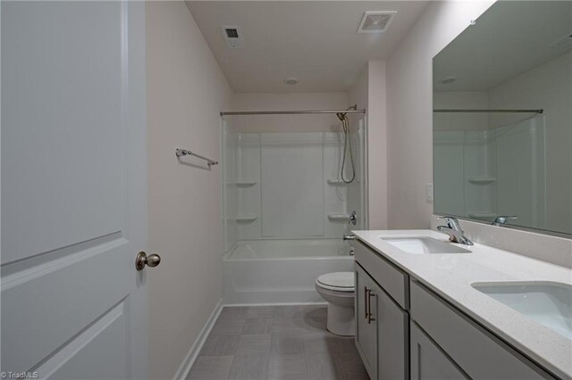 3661 Tyburn Trce, Browns Summit, NC 27214 - bathroom with toilet, double vanity, tile patterned floors, baseboards, and shower / bath combination