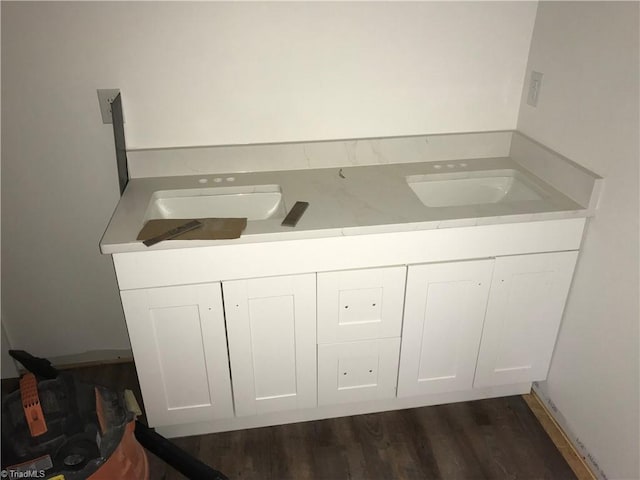 bathroom with hardwood / wood-style floors