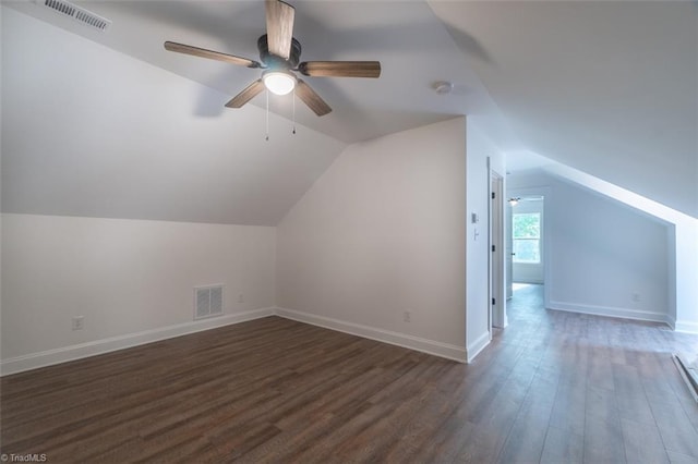 additional living space featuring vaulted ceiling, ceiling fan, and dark hardwood / wood-style floors