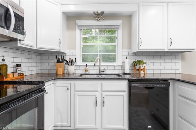 3717 Rock Haven Dr, Greensboro, NC 27410 - kitchen featuring black appliances, white cabinetry, dark stone counters, and tasteful backsplash