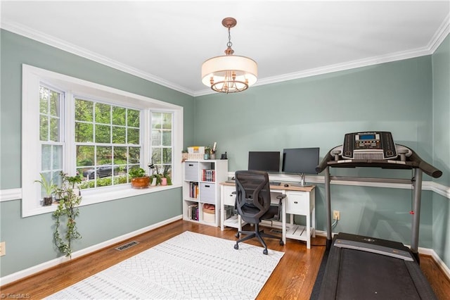 3717 Rock Haven Dr, Greensboro, NC 27410 - office area with wood finished floors, crown molding, and a chandelier