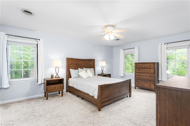 3717 Rock Haven Dr, Greensboro, NC 27410 - bedroom featuring light carpet and a ceiling fan