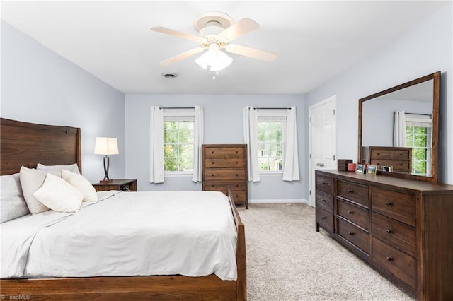 3717 Rock Haven Dr, Greensboro, NC 27410 - bedroom featuring light colored carpet and a ceiling fan