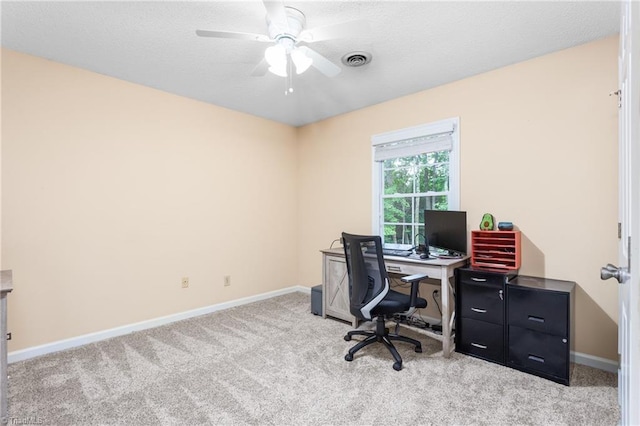 3717 Rock Haven Dr, Greensboro, NC 27410 - carpeted home office featuring a ceiling fan and a textured ceiling