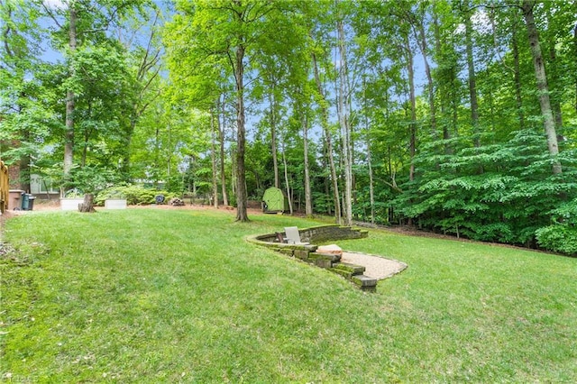3717 Rock Haven Dr, Greensboro, NC 27410 - view of grassy yard with a shed