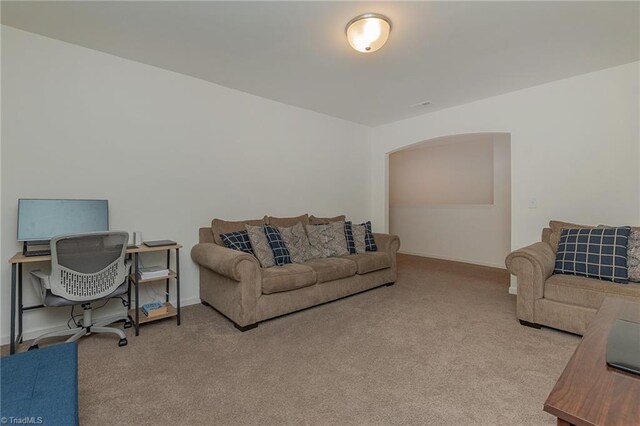 5968 Crescentbrook Ln, Clemmons, NC 27012 - living room featuring carpet floors, a desk, and baseboards