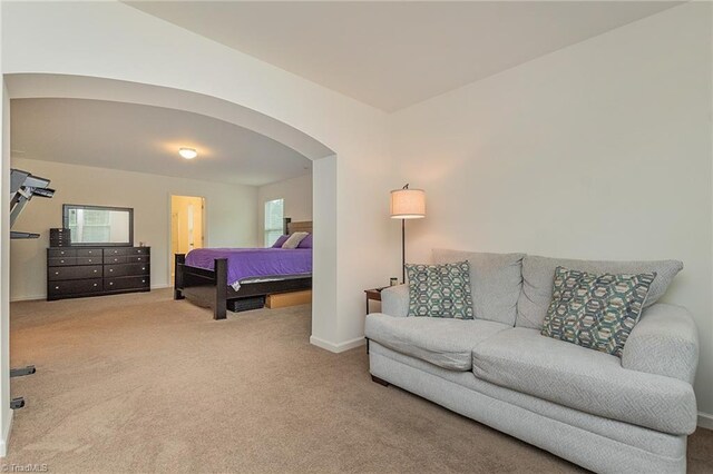 5968 Crescentbrook Ln, Clemmons, NC 27012 - bedroom with arched walkways, carpet, and baseboards