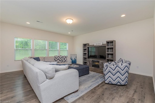 5968 Crescentbrook Ln, Clemmons, NC 27012 - living room with wood finished floors, baseboards, and recessed lighting