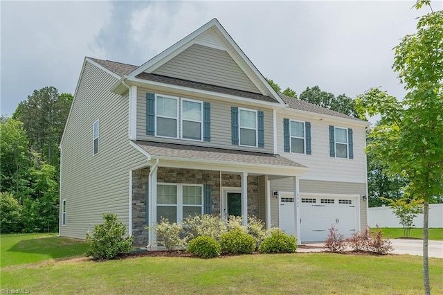 5968 Crescentbrook Ln, Clemmons, NC 27012 - view of front of home featuring a garage, driveway, stone siding, and a shingled roof