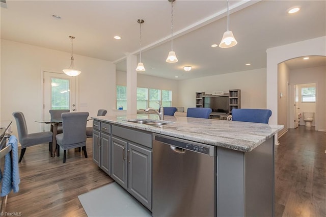 5968 Crescentbrook Ln, Clemmons, NC 27012 - kitchen with dishwasher, gray cabinets, a sink, arched walkways, and plenty of natural light