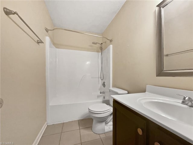 full bath featuring vanity, tile patterned floors, toilet, and  shower combination