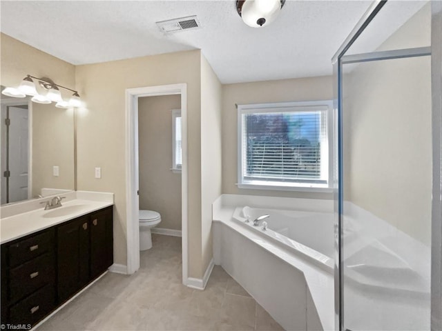 full bath with visible vents, toilet, a garden tub, a stall shower, and vanity