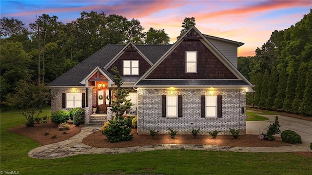 122 K Fork Rd, Madison, NC 27025 - view of front facade with a front yard and brick siding