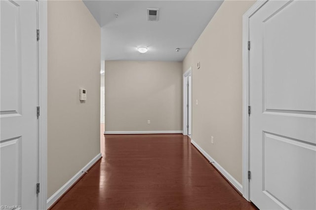 201 N Elm St Unit 703, Greensboro, NC 27401 - hall featuring wood finished floors and baseboards