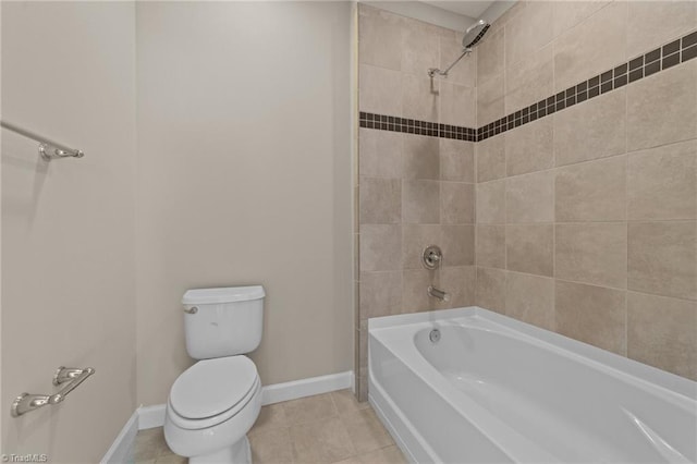 201 N Elm St Unit 703, Greensboro, NC 27401 - bathroom with baseboards, toilet, tile patterned flooring, and shower / bath combination