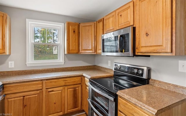 kitchen with appliances with stainless steel finishes