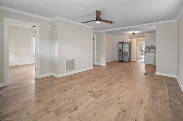 unfurnished living room featuring light wood-type flooring, ceiling fan, and crown molding