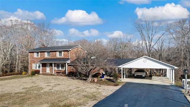 view of front property with a porch and a front yard