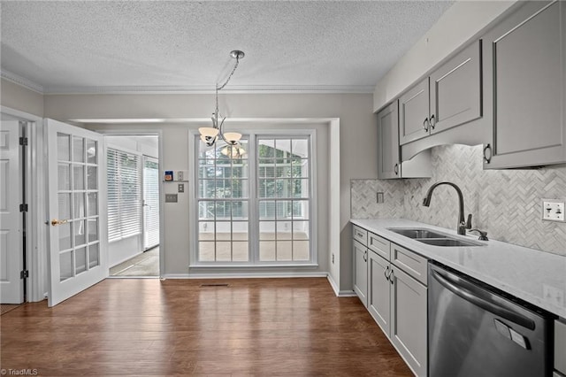 2424 Limner Ln, Winston-Salem, NC 27106 - kitchen with dishwasher, a sink, gray cabinets, a chandelier, and light countertops