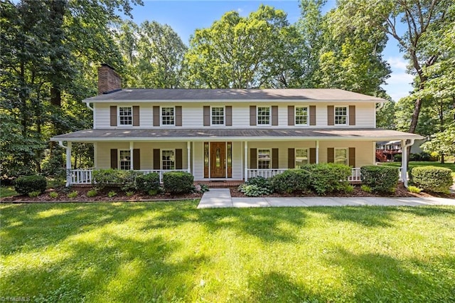 2424 Limner Ln, Winston-Salem, NC 27106 - view of front of property featuring a chimney, a porch, and a front lawn
