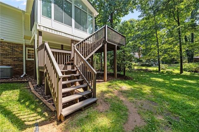 2424 Limner Ln, Winston-Salem, NC 27106 - deck featuring central air condition unit, stairway, and a lawn