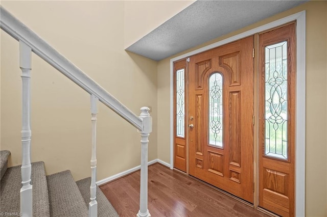 2424 Limner Ln, Winston-Salem, NC 27106 - entryway featuring wood finished floors, stairs, and baseboards