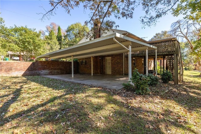 exterior space with a yard and a patio area