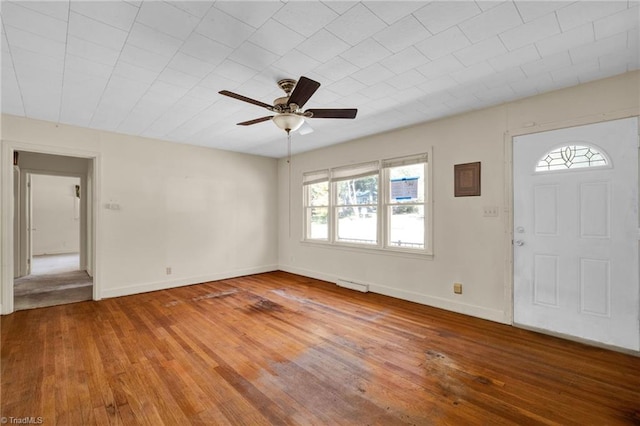 foyer entrance featuring wood-type flooring and ceiling fan