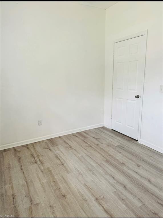 567 Townsend St, North Wilkesboro, NC 28659 - spare room with wood finished floors and baseboards