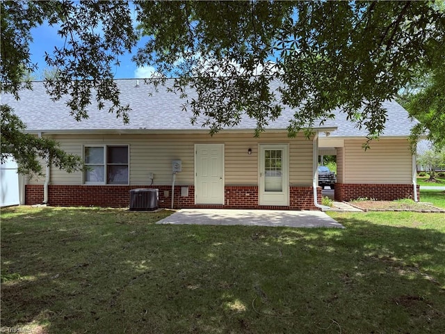 1770 Inglebrook Trl, Mount Airy, NC 27030 - back of house featuring a lawn, brick siding, and a patio
