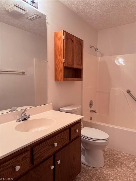 1770 Inglebrook Trl, Mount Airy, NC 27030 - bathroom with a textured ceiling, vanity, toilet, and washtub / shower combination
