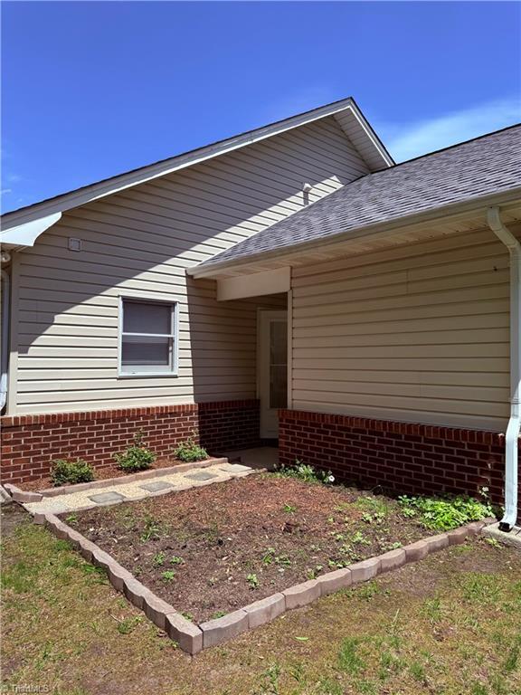 1770 Inglebrook Trl, Mount Airy, NC 27030 - view of exterior entry with brick siding
