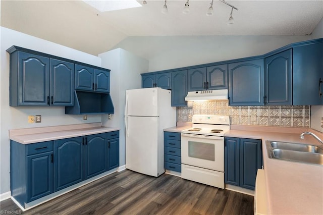 kitchen featuring white appliances, vaulted ceiling with skylight, a sink, under cabinet range hood, and blue cabinets