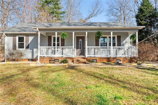 view of front of home featuring crawl space, a porch, and a front yard