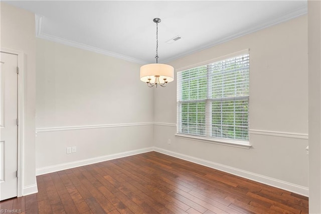 spare room with baseboards, dark wood-style floors, and a notable chandelier