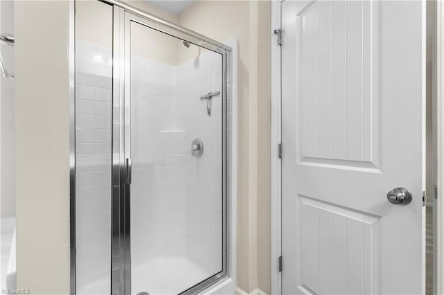bathroom featuring a stall shower
