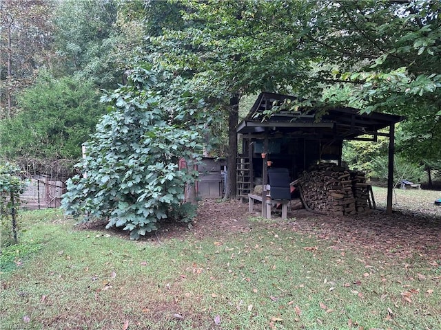 view of yard with a wooden deck