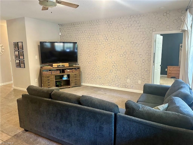 carpeted living room featuring ceiling fan