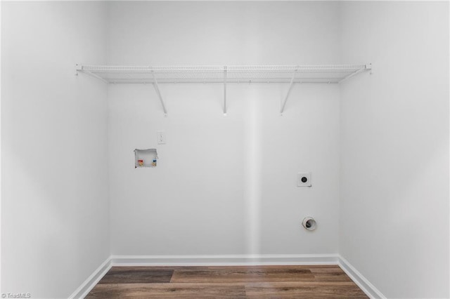 laundry area featuring laundry area, washer hookup, dark wood-style flooring, and hookup for an electric dryer