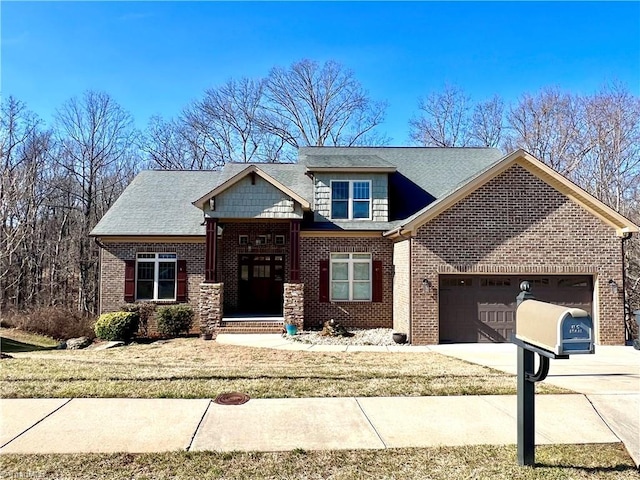 view of front of house with a garage and a front yard