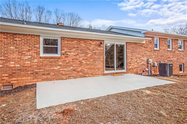 back of house featuring a patio area and central air condition unit