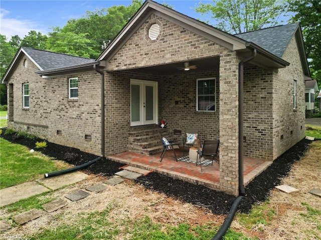 back of house featuring a patio area and french doors