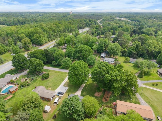 4904 Kacia Ct, Greensboro, NC 27407 - drone / aerial view featuring a wooded view