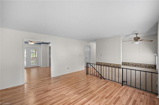 4904 Kacia Ct, Greensboro, NC 27407 - spare room with ceiling fan and light wood-style flooring