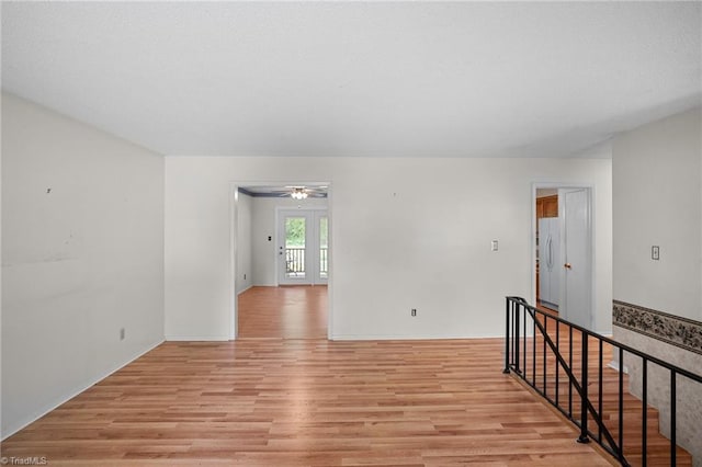 4904 Kacia Ct, Greensboro, NC 27407 - empty room with ceiling fan and light wood-type flooring